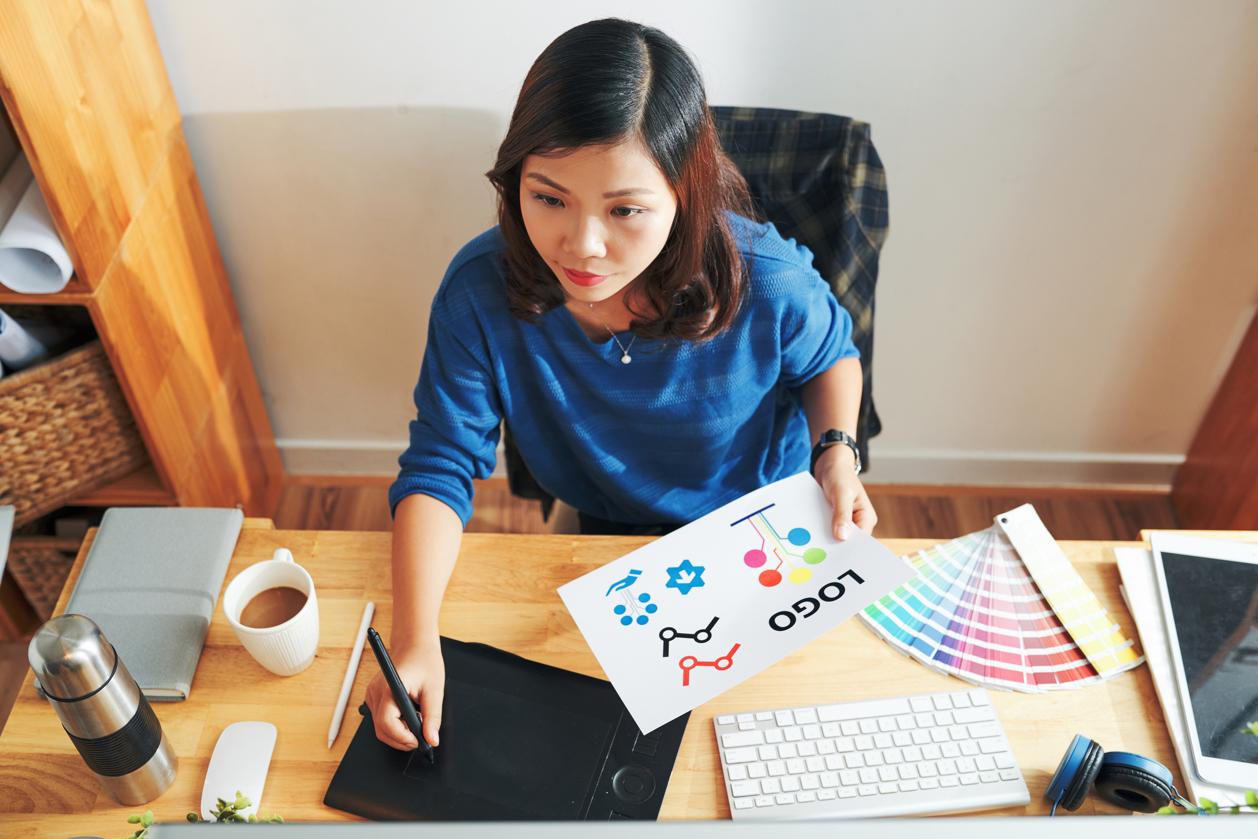 Designer Drawing Logotype